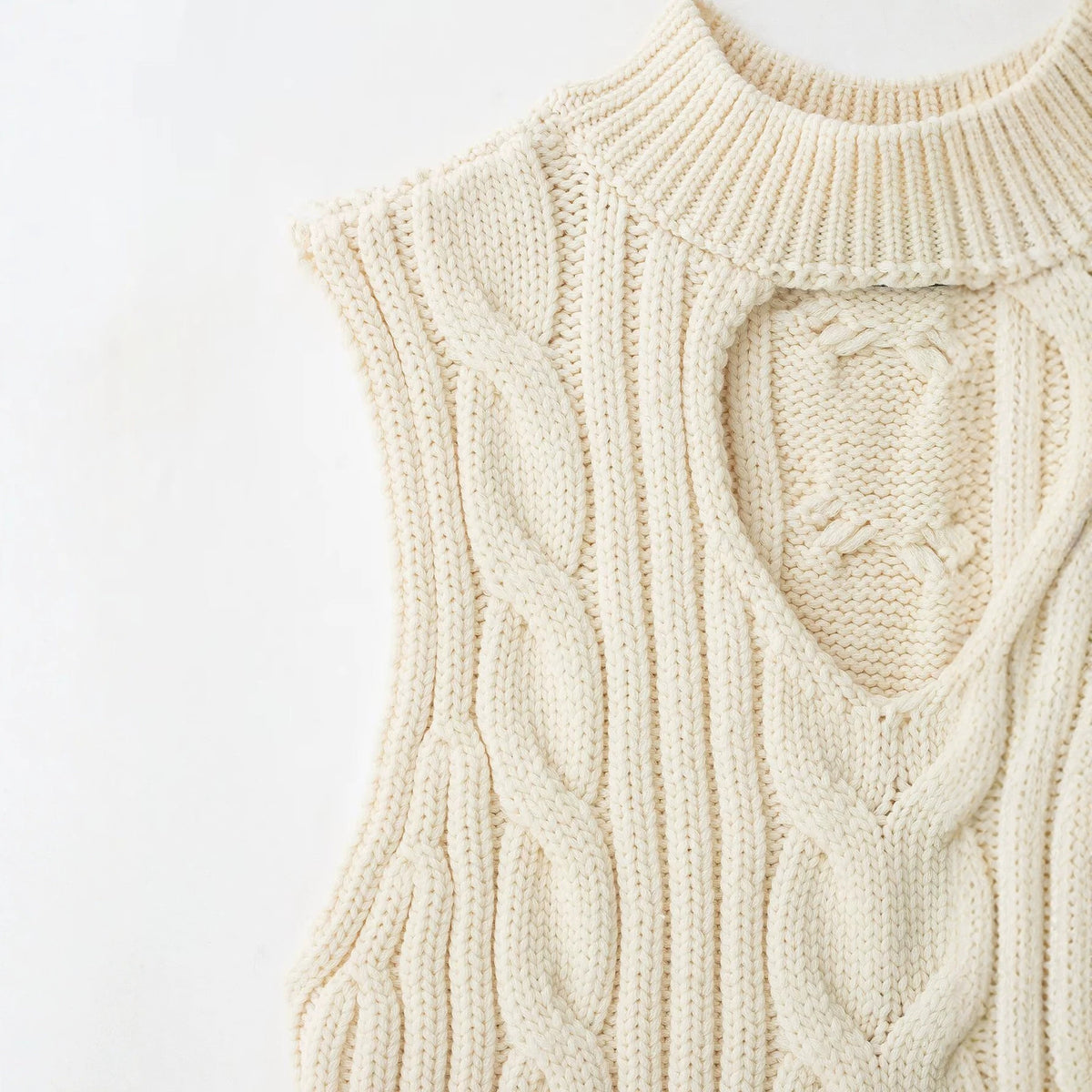 Casual slim fit hollow twisted rope knitted sweater top for women